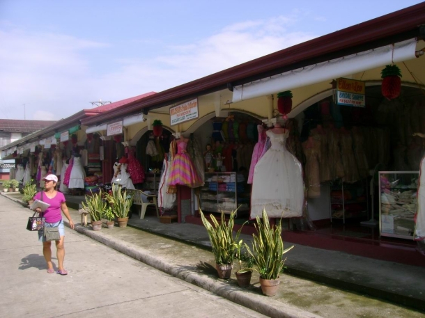 A row of Barong Tagalog stalls at the public market.